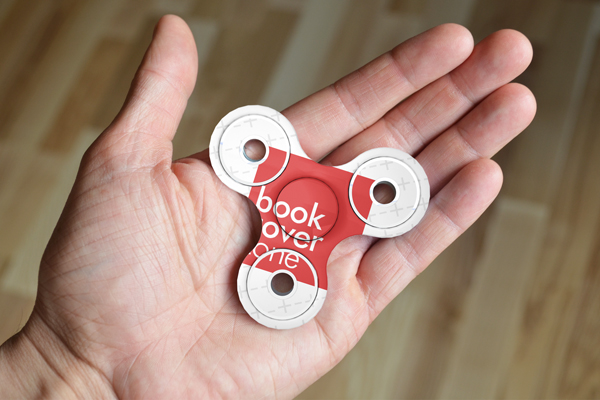 Fidget Spinner in Hand Mockup