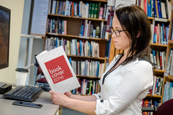 Mockup of Woman Reading in Library