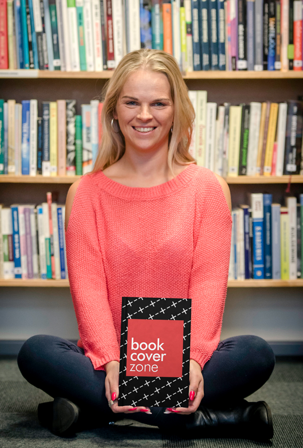 Mockup of a Smiling Girl with a Book