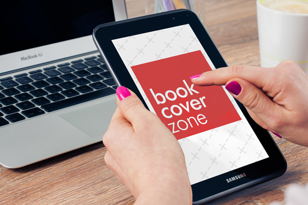 Woman Browsing on Tablet and Laptop